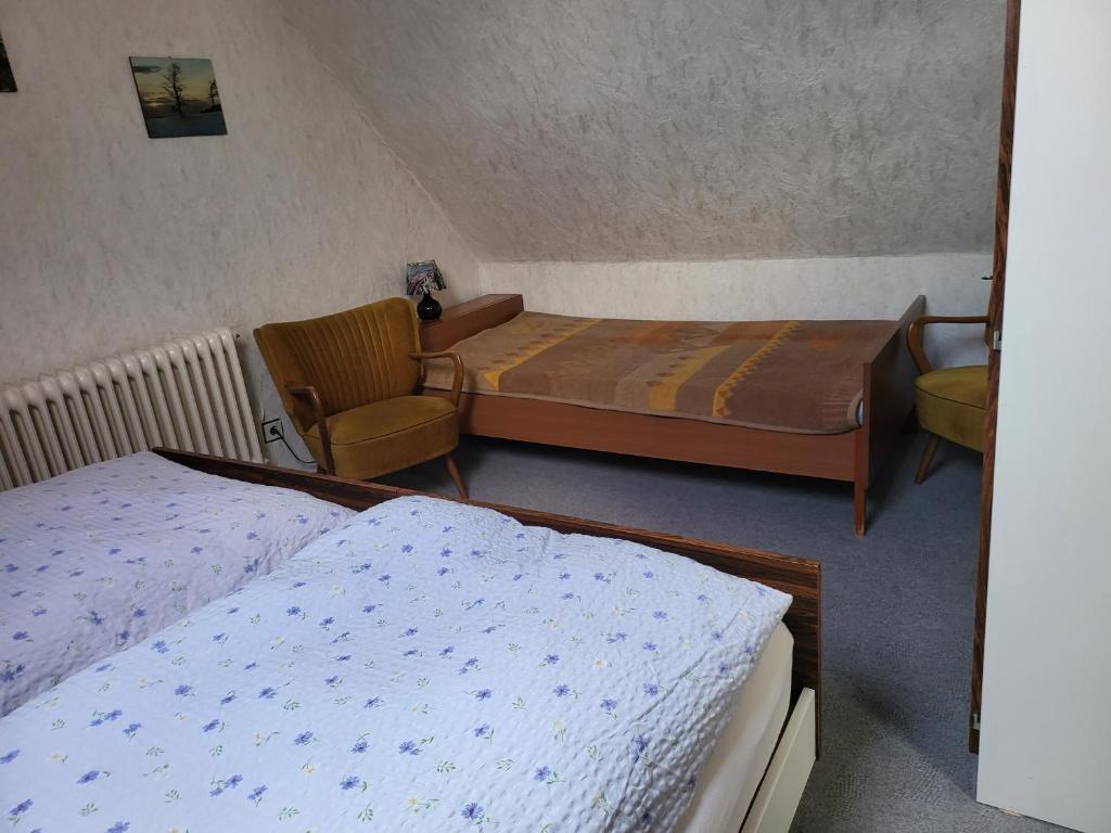 Postel nebo postele na pokoji v ubytování Hotel Zur Schanze
