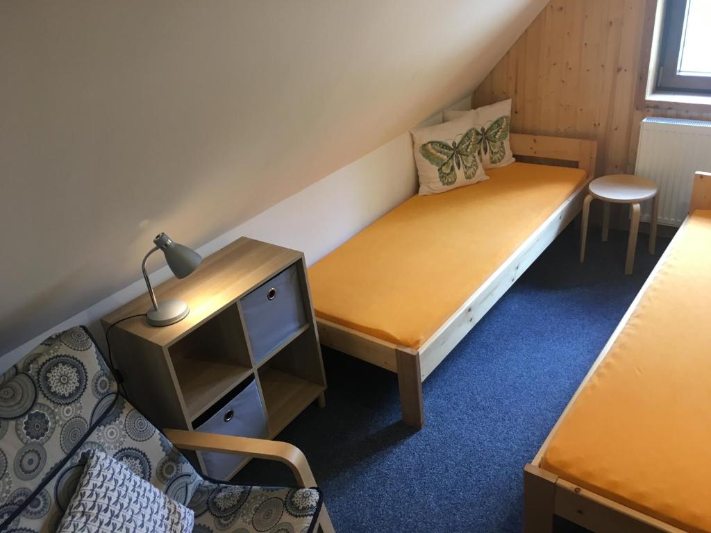 Postel nebo postele na pokoji v ubytování Penzion REHEK