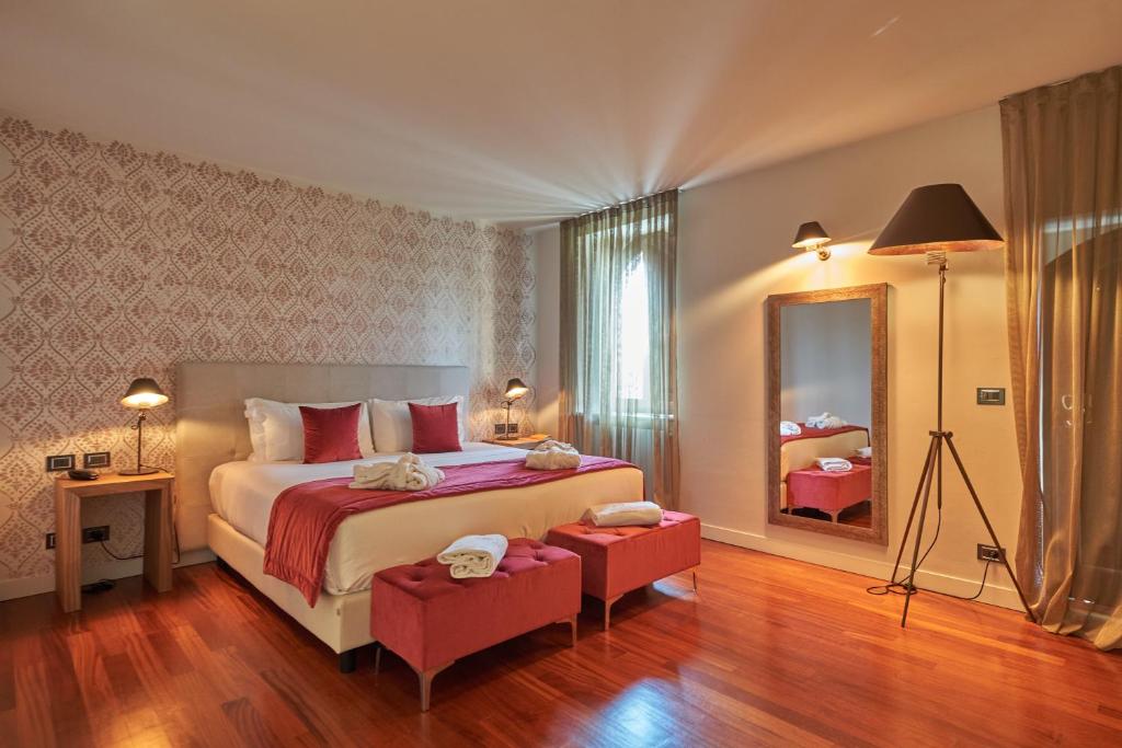 Posteľ alebo postele v izbe v ubytovaní Relais Santo Stefano