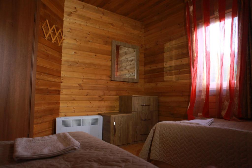 Postel nebo postele na pokoji v ubytování Cottage Woodside