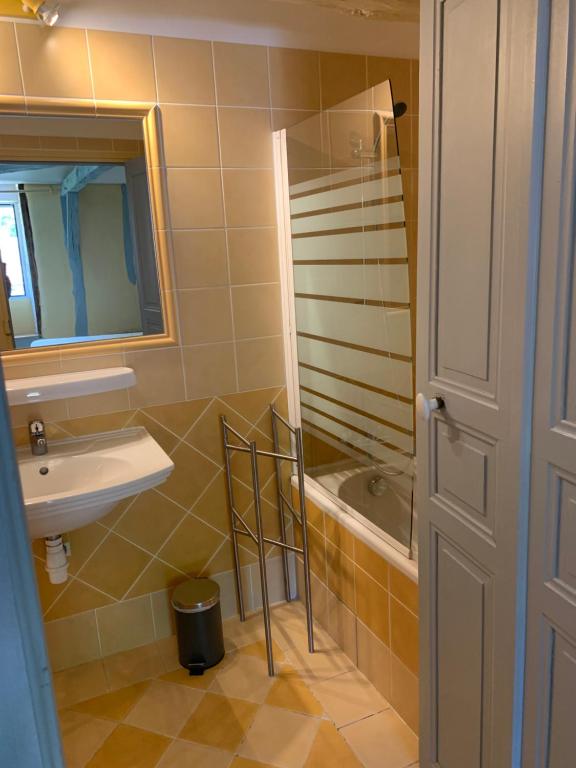 Koupelna v ubytování Chambres d'hôtes Maison Redon