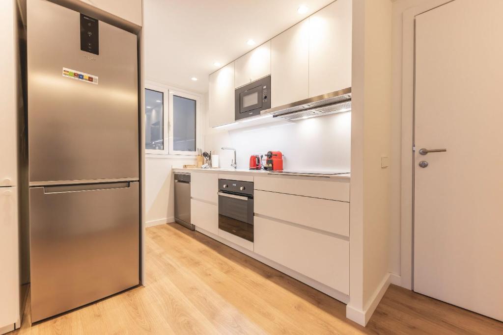 Kuchyňa alebo kuchynka v ubytovaní Bravissimo Afra, 2-bedroom apartment