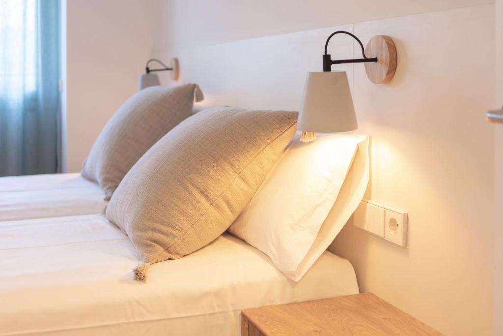 Posteľ alebo postele v izbe v ubytovaní Bravissimo Afra, 2-bedroom apartment