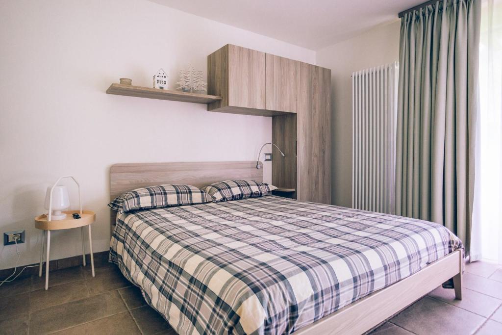 Letto o letti in una camera di Chalet Valcanale
