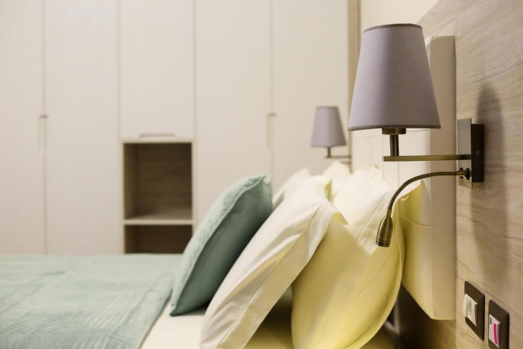 Postel nebo postele na pokoji v ubytování Hotel VD Roleks