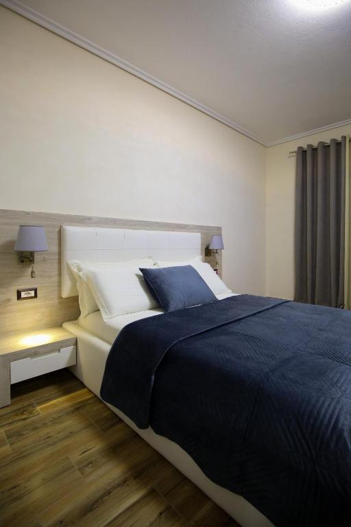 Postel nebo postele na pokoji v ubytování Hotel VD Roleks