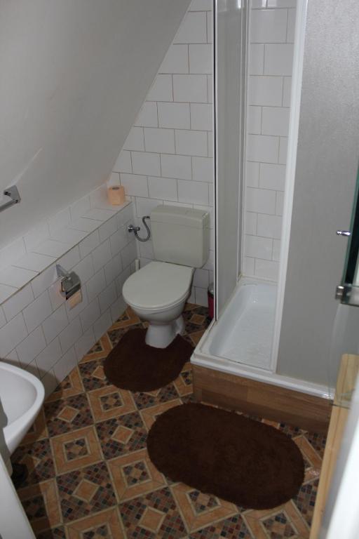 Koupelna v ubytování Hotel Corrado