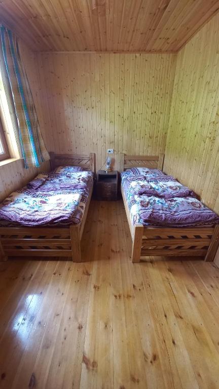 Postel nebo postele na pokoji v ubytování Guest House ELISABETH