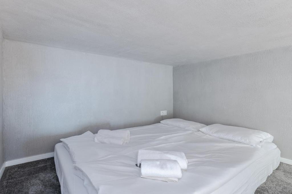 Posteľ alebo postele v izbe v ubytovaní Parkside Fresh Apartments - Old Town Guesthouse - by Upstairs