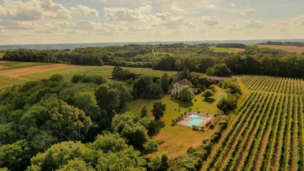 an aerial view of a estate with a swimming pool at La Grange @ Le Prielle in Madiran
