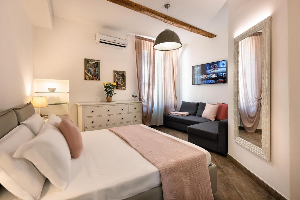 Posteľ alebo postele v izbe v ubytovaní Rooms Old Port Genova