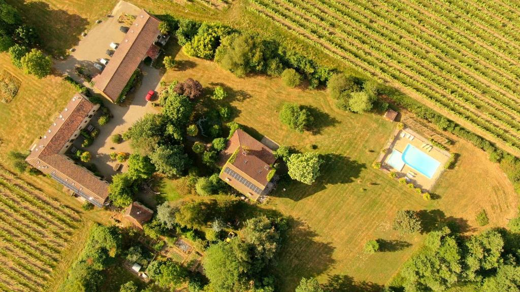 an aerial view of a house in a field at Le Chai @ Le Prielle in Madiran