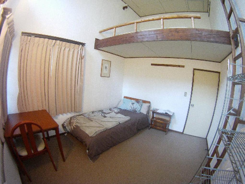 Postel nebo postele na pokoji v ubytování Chalet Myoko