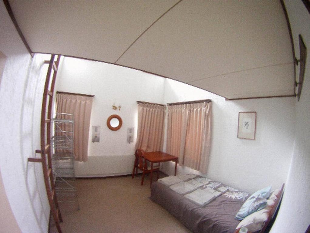 Postel nebo postele na pokoji v ubytování Chalet Myoko