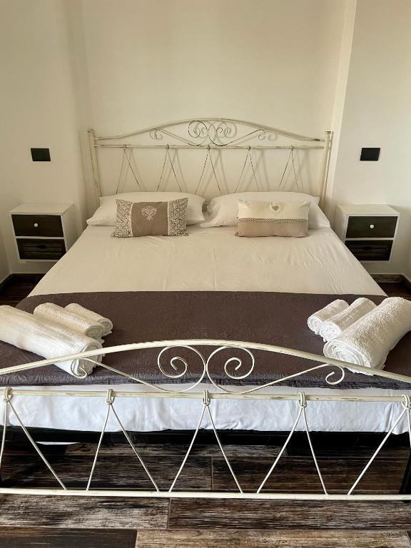 Postel nebo postele na pokoji v ubytování Elios Rooms