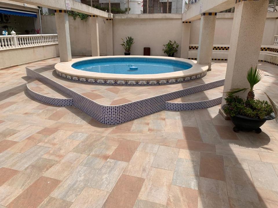 Bazén v ubytování Apartamento de la playa nebo v jeho okolí