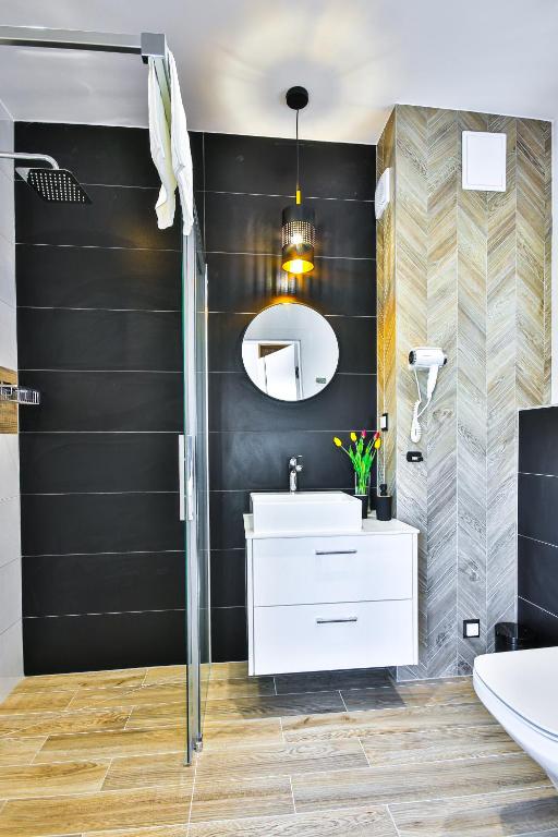Koupelna v ubytování Klif Resort Apartamenty