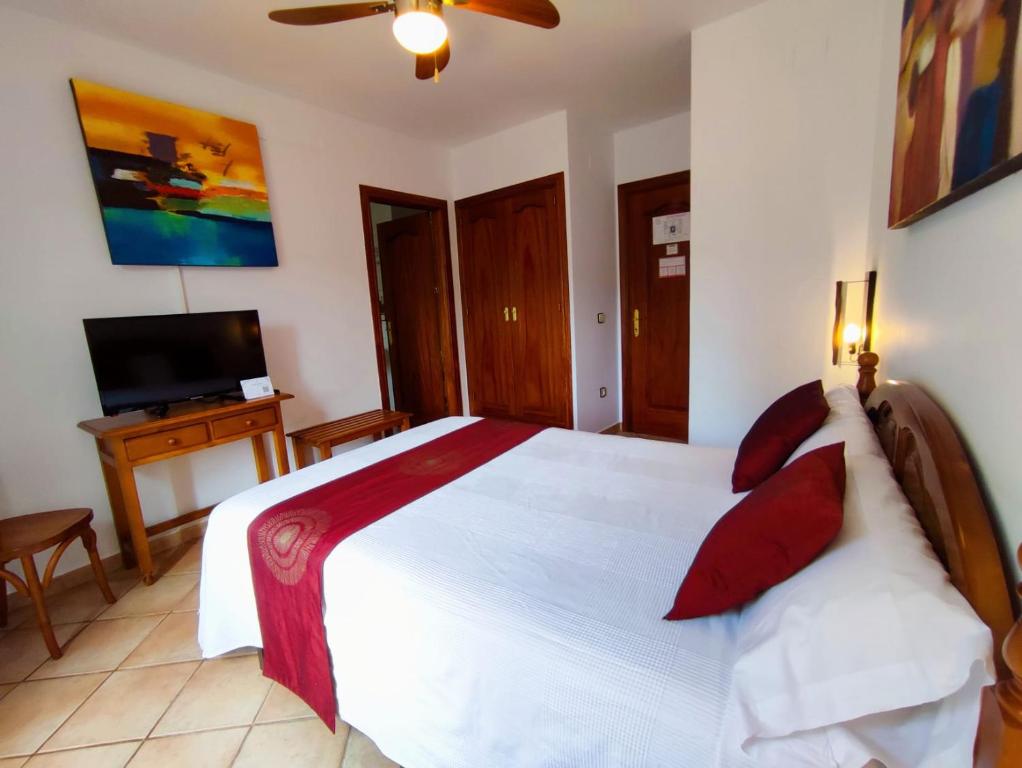 Postel nebo postele na pokoji v ubytování Hotel Rural LAbadia de Sieste