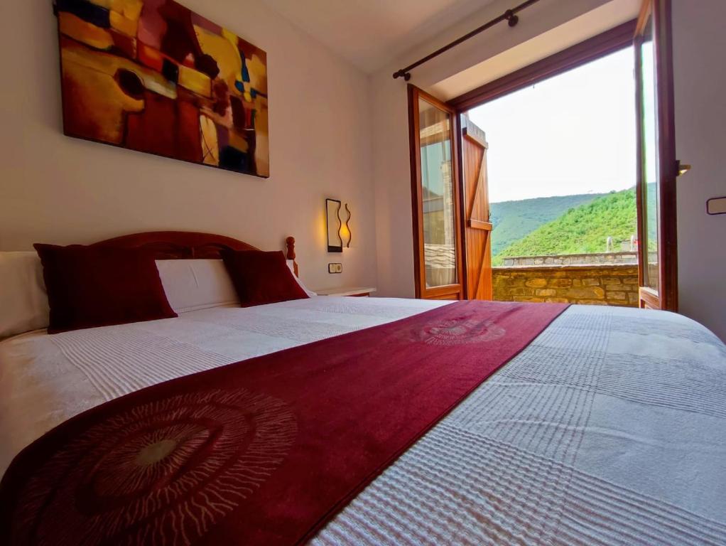 Postel nebo postele na pokoji v ubytování Hotel Rural LAbadia de Sieste