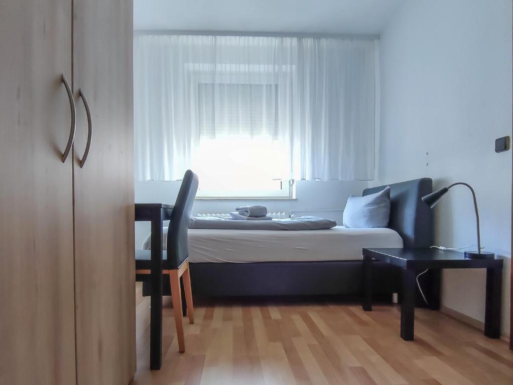 Postel nebo postele na pokoji v ubytování Zwehrener Hof