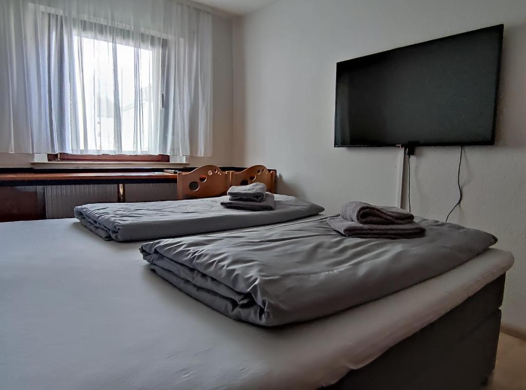 Postel nebo postele na pokoji v ubytování Zwehrener Hof