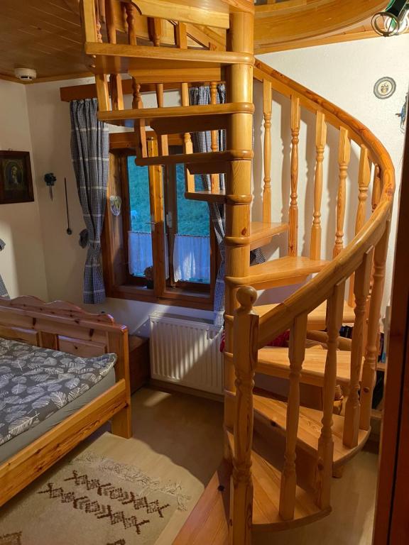 Postel nebo postele na pokoji v ubytování Hiša pod Rogatcem