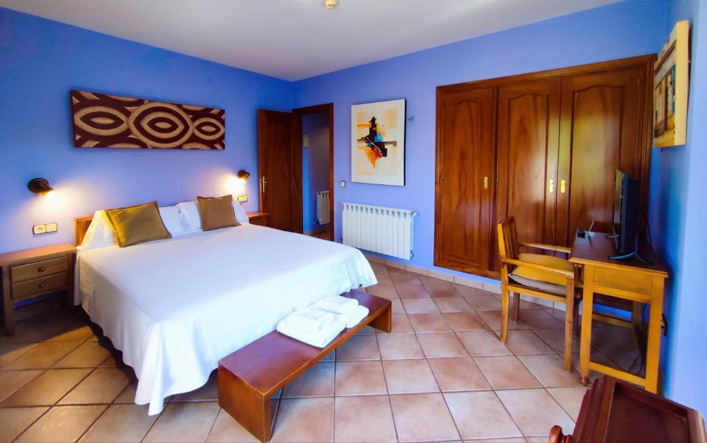 Postel nebo postele na pokoji v ubytování Hotel Rural LAbadia de Sieste