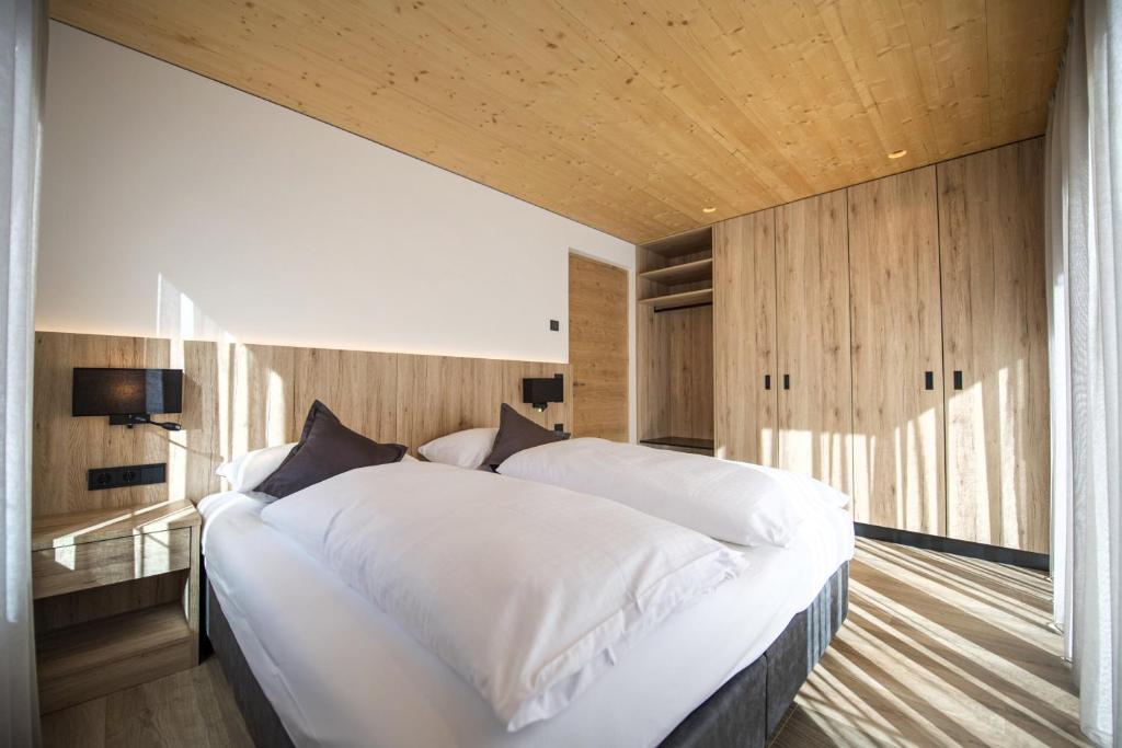 Łóżko lub łóżka w pokoju w obiekcie Apartments Dami