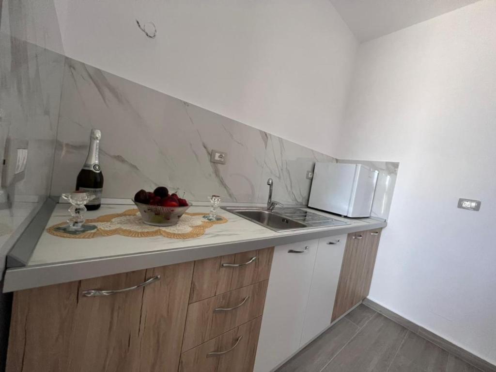 Kuchyň nebo kuchyňský kout v ubytování Fiori Rooms