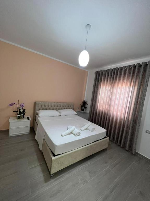 Postel nebo postele na pokoji v ubytování Fiori Rooms