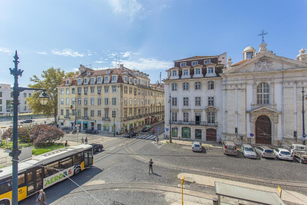 Nespecifikovaný výhled na destinaci Lisabon nebo výhled na město při pohledu z penzionu