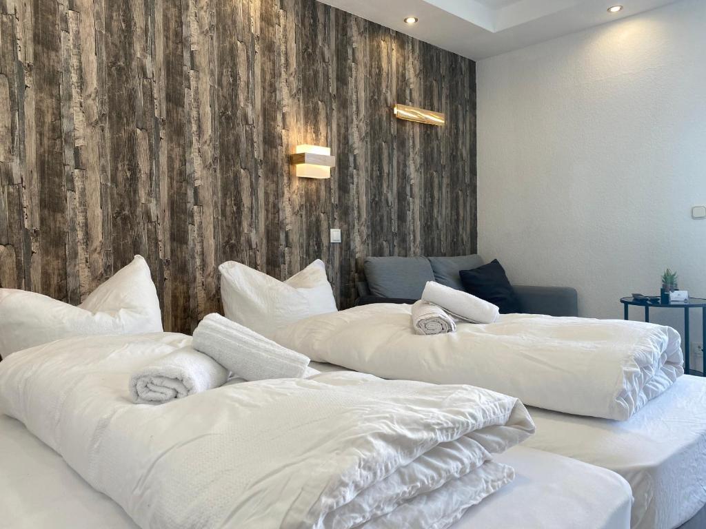 Giường trong phòng chung tại Charming Apartment - Balcony - Netflix - Kitchen