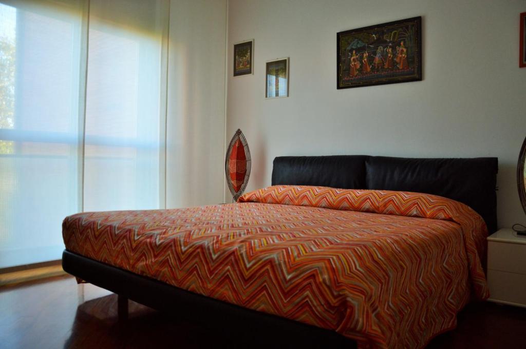 Postel nebo postele na pokoji v ubytování B&B A Casa di Andrea