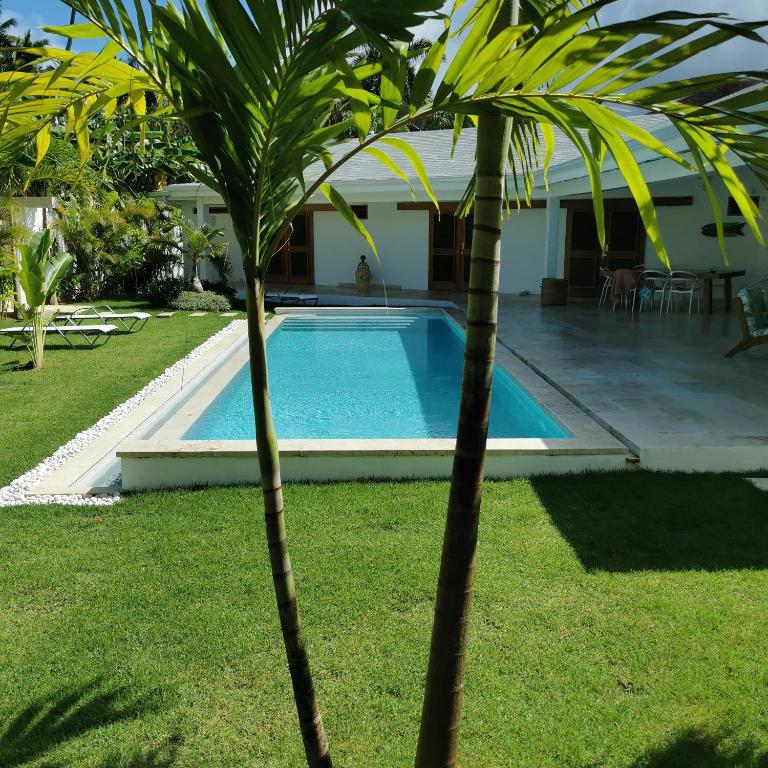 Bazén v ubytování Flor de Coco, Villa neuve, 5 chambres, 5 salles de bains et grande piscine à 250 mètres de la plage nebo v jeho okolí