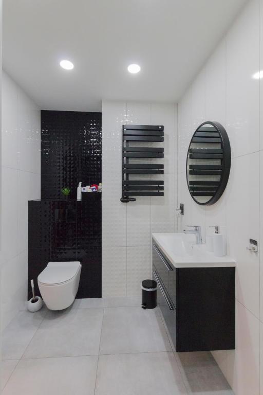 Kúpeľňa v ubytovaní Apartament przy jeziorze nr 2