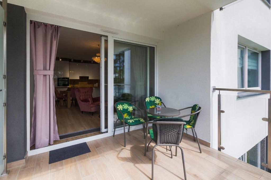 Balkón alebo terasa v ubytovaní Apartament przy jeziorze nr 2