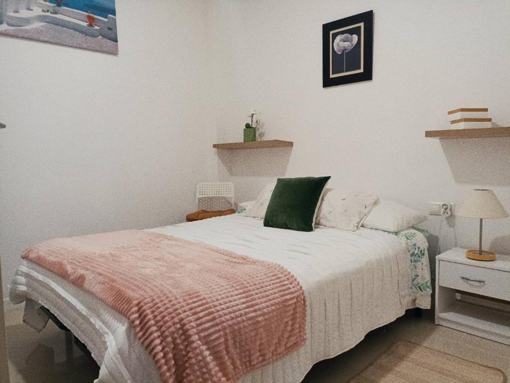 Cama o camas de una habitación en Céntrico y acogedor apartamento