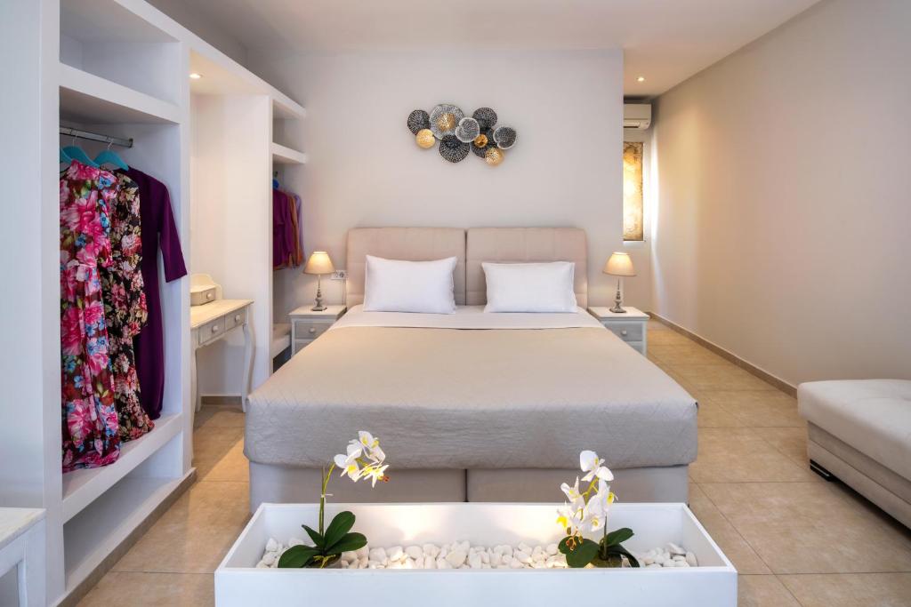 Un pat sau paturi într-o cameră la George Apartment