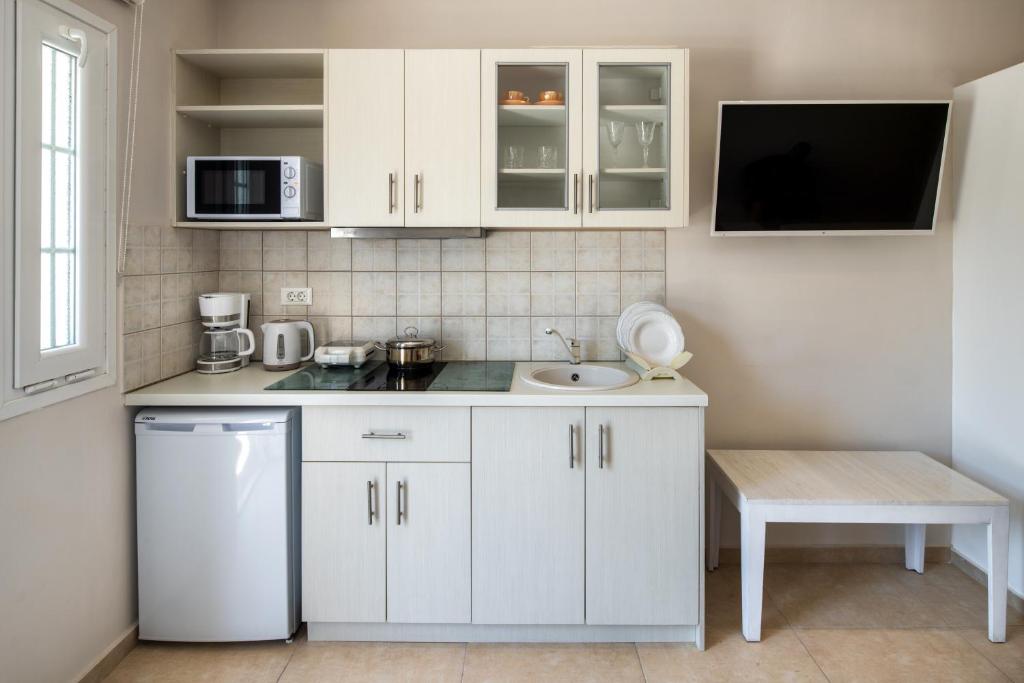 Kuchyň nebo kuchyňský kout v ubytování George Apartment