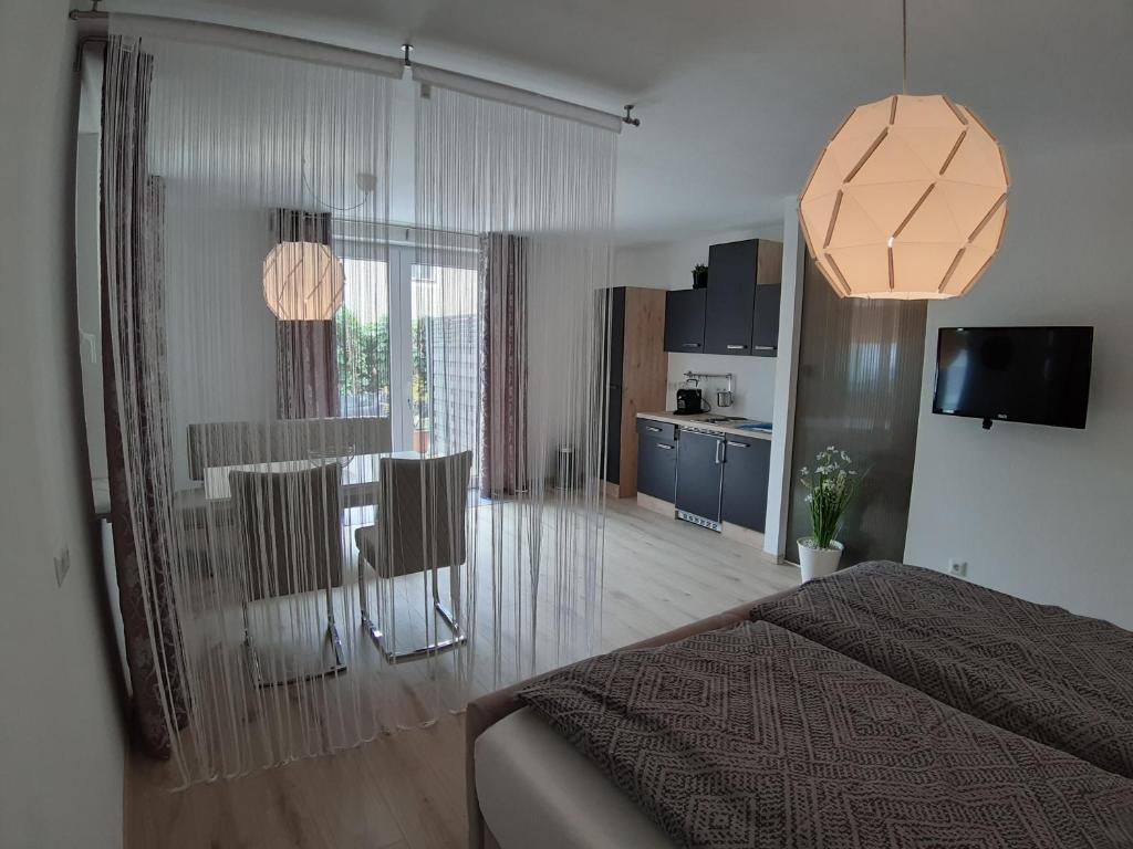 Postel nebo postele na pokoji v ubytování Ferienappartement 1 beim Strandbad