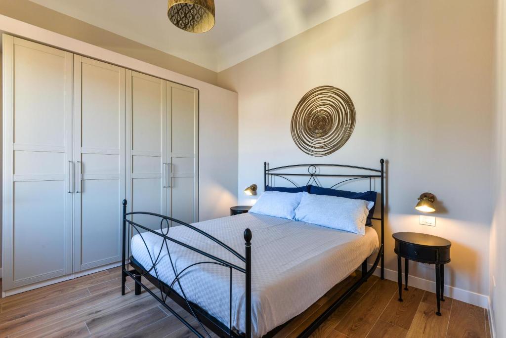 A bed or beds in a room at Casa Carol