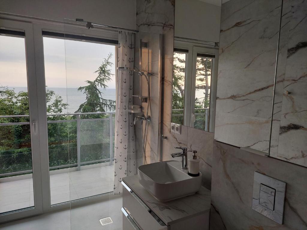 Fotografia z galérie ubytovania APARTAMENT BALTICHOFF PREMIUM with Sea View, Basen, Spa, Gym, Sauna, hala sportowa z kortem tenisowym v destinácii Gąski