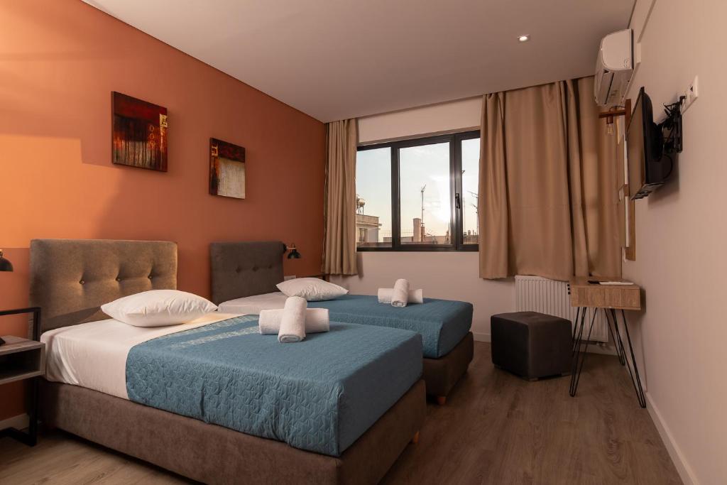 Postel nebo postele na pokoji v ubytování Dunlin Hotel