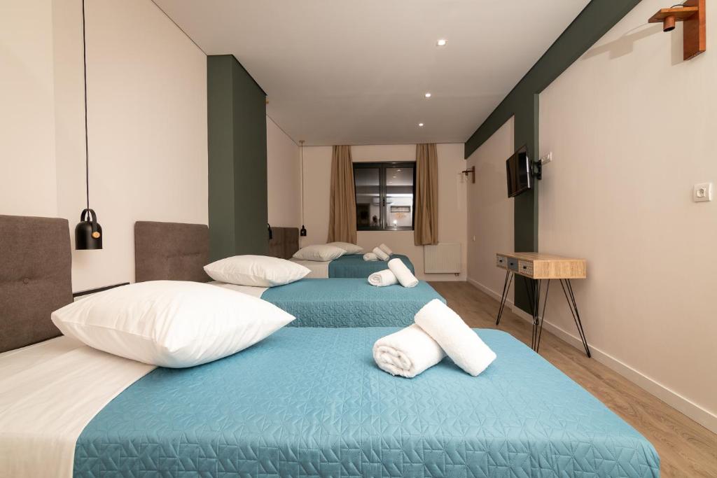 Postel nebo postele na pokoji v ubytování Dunlin Hotel