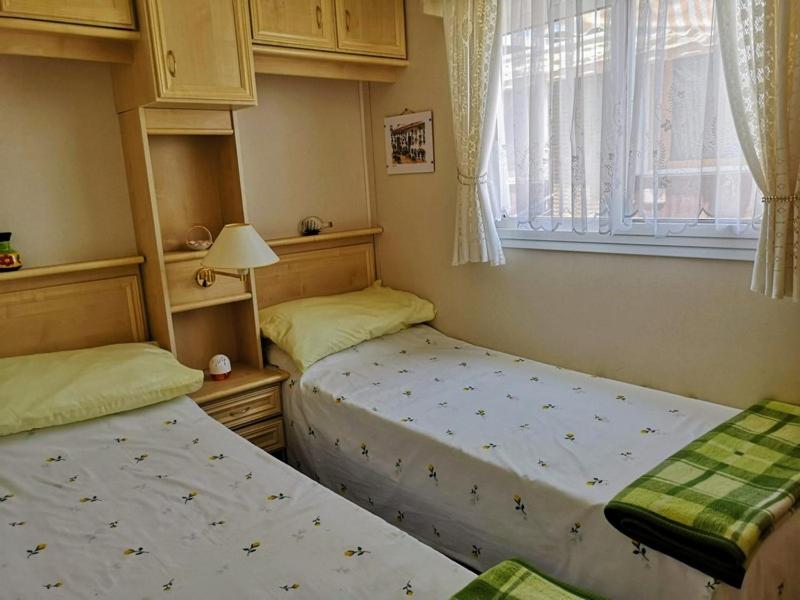 Łóżko lub łóżka w pokoju w obiekcie Los Gallardos Leisure