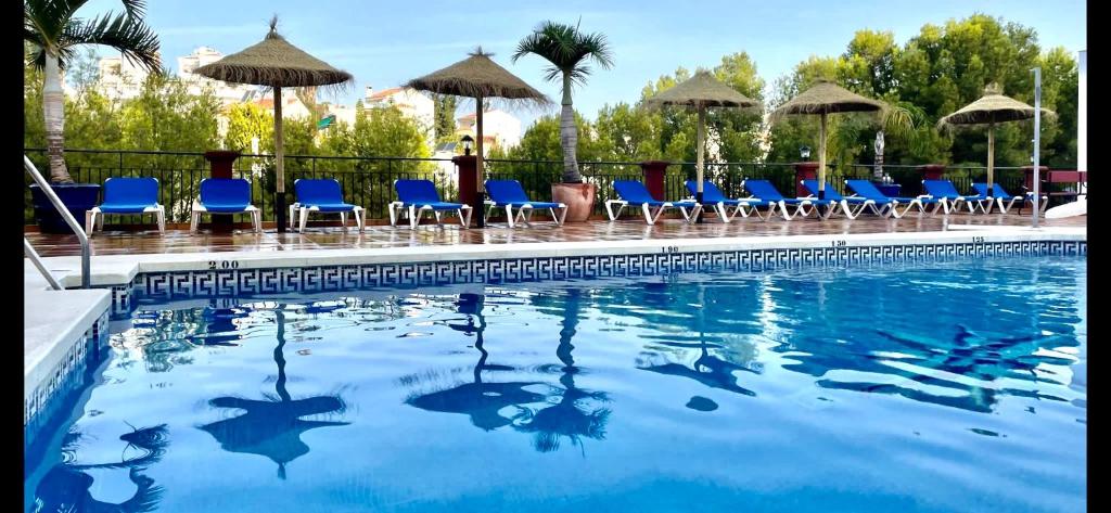 Bazén v ubytování Apartment in Burriana, Nerja nebo v jeho okolí