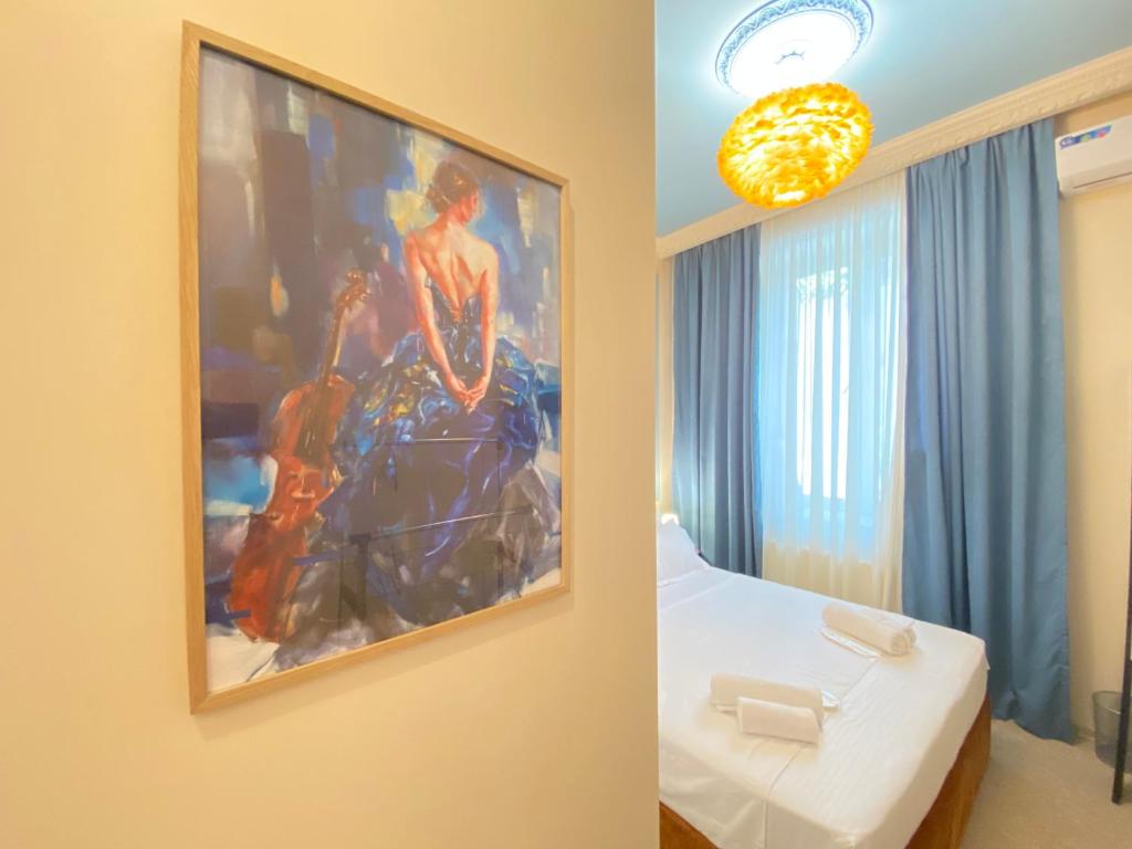 Postel nebo postele na pokoji v ubytování Mose art Hotel