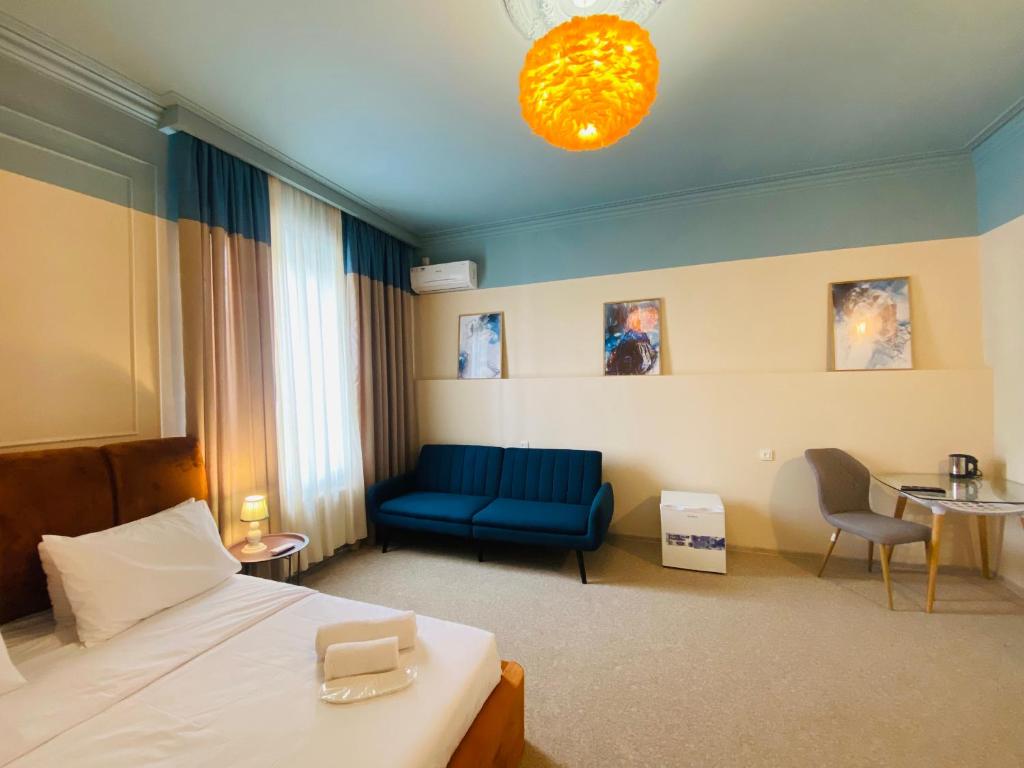 Postel nebo postele na pokoji v ubytování Mose art Hotel