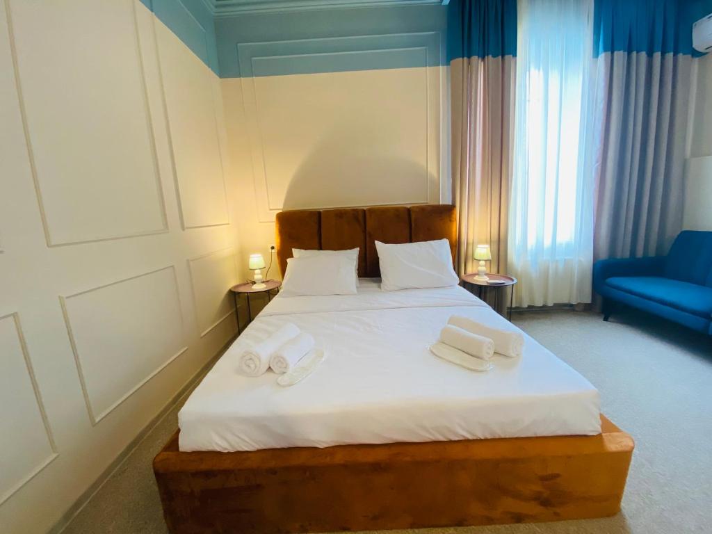 Postel nebo postele na pokoji v ubytování Mose art Hotel