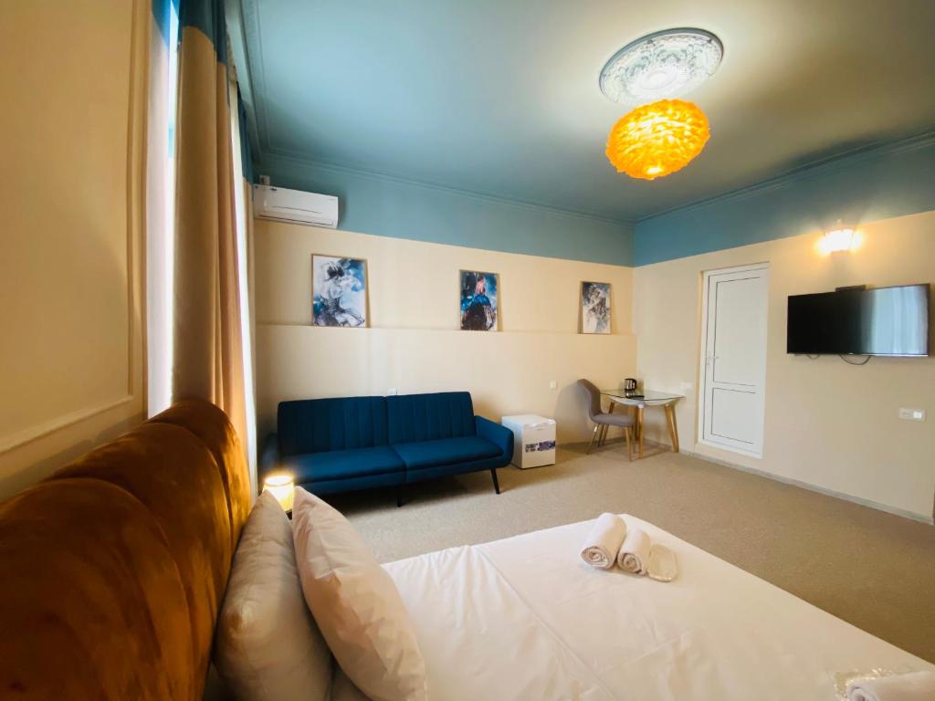 Postel nebo postele na pokoji v ubytování Mose art Hotel